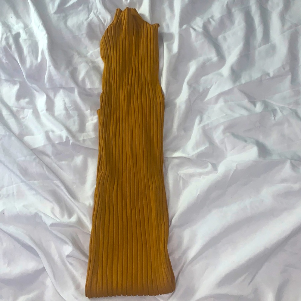 Blowout SALE! This lovely mustard colored dress is ready for a night on the town